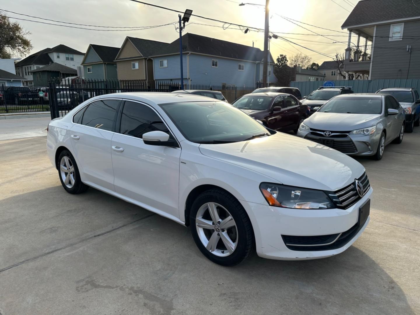 2014 White /Black Volkswagen Passat 1.8T S AT (1VWAS7A34EC) with an 1.8L L4 TURBO DIESEL engine, 6-Speed Automatic transmission, located at 1501 West 15th St., Houston, 77008, (713) 869-2925, 29.797941, -95.411789 - Photo#1